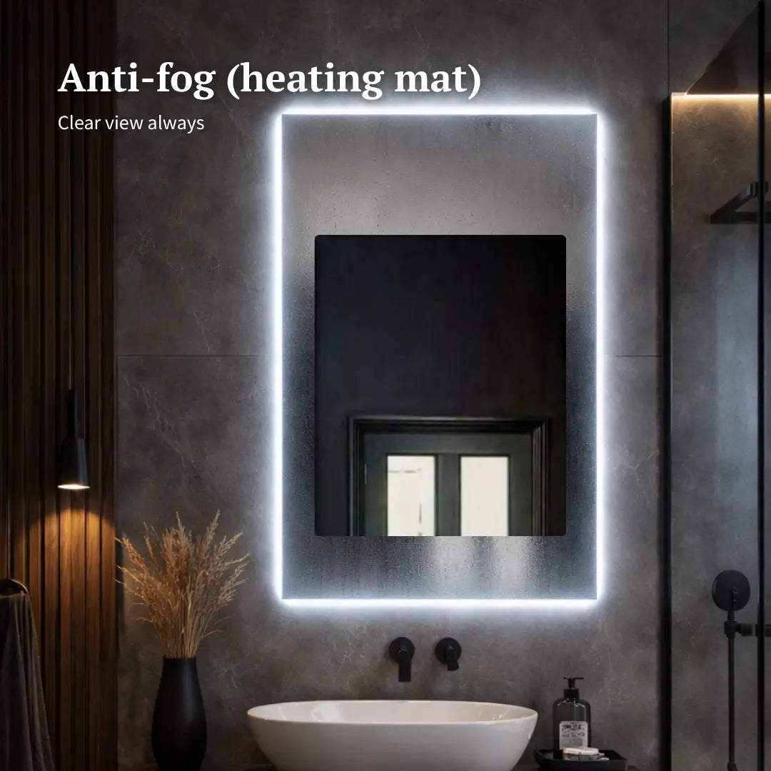 Bathroom setting with a heated mirror and text indicating anti-fog feature.