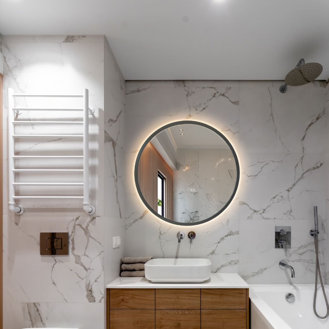 Round black framed mirror with rear lighting Ø 600mm