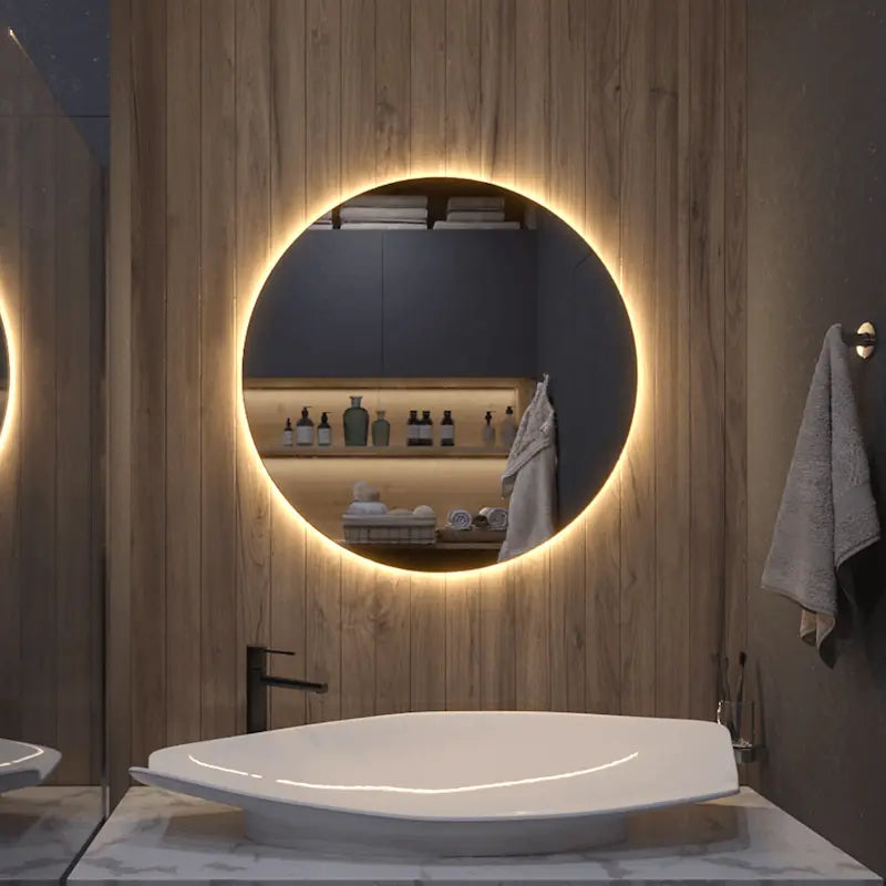 Round LED mirror with backlight mounted on a wooden wall above sink