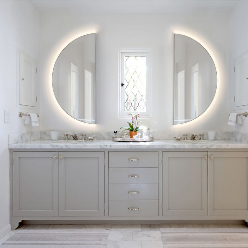 two semi-circular LED mirror in the bathroom