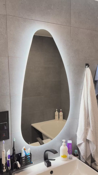 Irregular mirror with rear lighting  505x1000mm